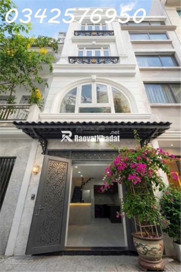 Bán nhà 2 tầng 21m² Nguyễn Thần Hiến, Q.4, 5.6 tỷ, sổ đỏ.